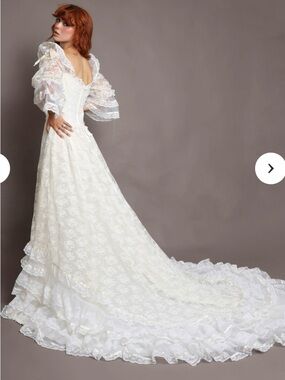 1980s Romantic Ivory Lace Bridal Gown with Statement Sleeves